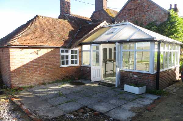 The existing conservatory being prepared to be pulled down